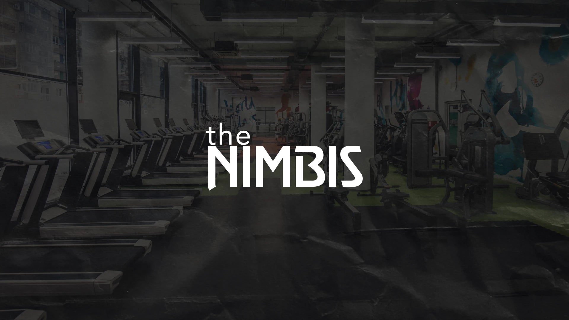 Gym interior with The Nimbis logo displayed across the scene